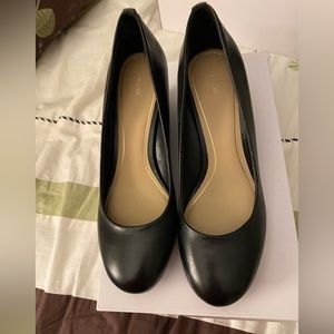 New in box Aldo Black Leather Wedge Heels size 7, never been worn.